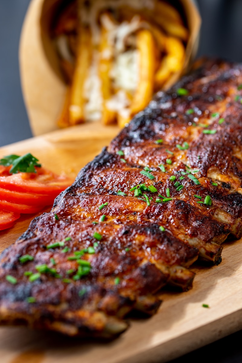 a close up of a fish on a cutting board